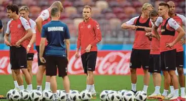 ?? PIC EPA ?? Denmark’s Christian Eriksen (centre) attends training with teammates at Luzhniki Stadium