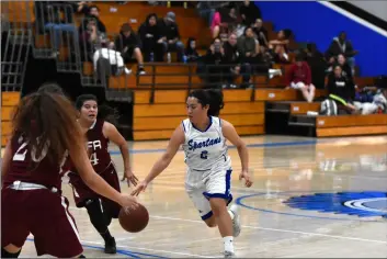  ??  ?? Spartan guard Dalhia Ruiz drives into the teeth of the Kofa defense during Tuesday’s 48-43 home win over the Kings. PHOTO AARON BODUS