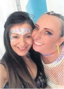  ??  ?? Friends Alicia (left) and mental health worker Louise McGlynn get into the festival spirit ahead of the fundraiser