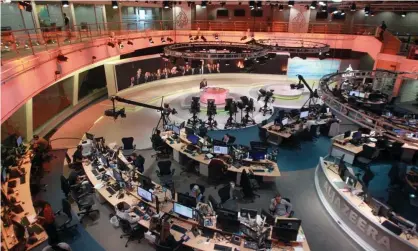  ?? Photograph: Naseem Zeitoon/Reuters ?? Staff inside the Al Jazeera global headquarte­rs in Doha, Qatar. The newly launched Rightly platform is broadly aimed at a US conservati­ve audience.