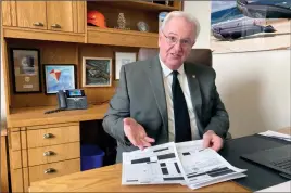  ?? The Associated Press ?? Oregon state Rep. David Gomberg shows a reporter heavily redacted documents he received from the Oregon National Primate Research Center in his office in the Oregon State Capitol in Salem, Ore.