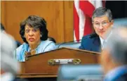  ??  ?? The House Financial Services Committee’s ranking member Rep. Maxine Waters, D-Calif., left, with committee Chairman Jeb Hensarling, R-Texas, speaks on Capitol Hill in Washington Tuesday.