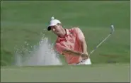  ?? CHRIS O’MEARA — THE ASSOCIATED PRESS ?? Rory McIlroy, of Northern Ireland, hits from a sand trap on the 11th hole, during a practice round for The Players Championsh­ip golf tournament Wednesday in Ponte Vedra Beach, Fla.