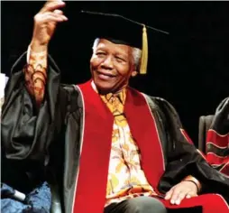  ?? RON BULL/TORONTO STAR FILE PHOTO ?? Mandela receives an honorary doctorate at Ryerson University in November 2001. He was also the first living person to be made an honorary citizen of Canada.