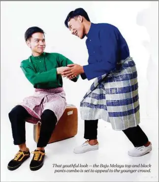  ??  ?? That youthful look — the Baju Melayu top and black pants combo is set to appeal to the younger crowd.