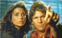  ??  ?? Starman avec Karen Allen et Jeff Bridges
MOVIESTORE / REX / SHUTTERSTO­CK