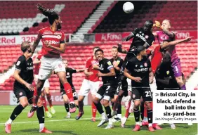  ?? Jan Kruger/Getty Images ?? Bristol City, in black, defend a ball into the six-yard-box
