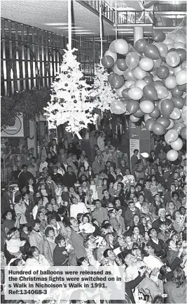  ?? ?? Hundred of balloons were released as the Christmas lights were switched on in s Walk in Nicholson’s Walk in 1991. Ref:134068-3