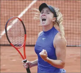  ?? AP PHOTO ?? Ukraine’s Elina Svitolina reacts as she defeats Croatia’s Petra Martic during their fourth-round match of the French Open tennis tournament at the Roland Garros stadium in Paris.