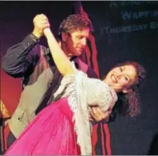  ?? SUBMITTED PHOTO ?? A NOSTALGIC TANGO: Jenny Diver (Holly Gash) and her former lover, the bandit Macheath (Blair Johnson), dance a tango in The Threepenny Opera, being presented by ActorsNET from July 14 to 30 at the Heritage Center Theatre, 635 N. Delmorr Avenue in...