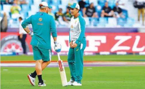  ?? Agence France-presse ?? ↑
Justin Langer (right) hails Australia’s balance starting with what he called as ‘one of the best opening partnershi­ps in the world between skipper Aaron Finch (left) and David Warner.