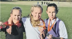  ??  ?? First three in the minor girls race were, from the left, Calleigh Caull, Ruby Blakeley and Jaia Bull.