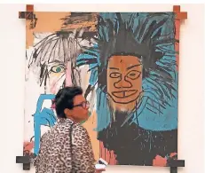  ?? FOTO: DPA ?? Jean-Michel Basquiats Arbeit „Dos Cabezas“ist in der Pariser Fondation Louis Vuitton ausgestell­t.