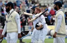  ?? PTI ?? England's Joe Root, centre left, celebrates with batting partner Jonny Bairstow after their win on the fifth day of the fifth cricket test match between England and India at Edgbaston in Birmingham, England, Tuesday