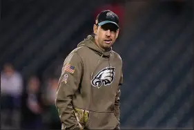  ?? MATT SLOCUM / ASSOCIATED PRESS FILE (2022) ?? Shane Steichen, offensive coordinato­r for the Philadelph­ia Eagles, watches warm-ups before Philadelph­ia’s Nov. 27, 2022, game against Green Bay in Philadelph­ia. Steichen’s path that has now led to him being considered one of the fastest-rising offensive minds in the National Football League included a stop at UNLV, where he played quarterbac­k from 2003 to 2006.