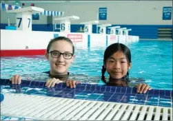  ?? YMCA photo ?? Amelia-Ahn Lou, 9, will participat­e in Saturday’s Interior Savings Across the Lake Swim. Her swim instructor, Emalie Schueler, has been training her for the 2.1-kilometre swim across Okanagan Lake.