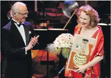  ?? VIA AP FILE ?? Finnish composer Kaija Saariaho receives the Polar Music Prize in 2013 from Sweden’s King Carl Gustaf at a ceremony in Stockholm.