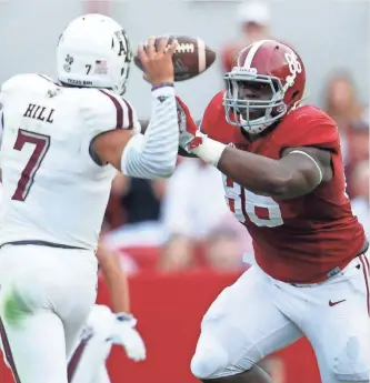  ?? MARVIN GENTRY, USA TODAY SPORTS ?? Alabama has seven defensive starters back, including lineman A’Shawn Robinson, right, and three on offense. A study shows returning more defenders is more crucial to success.