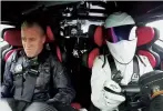  ??  ?? A terrified Matt being driven by The Stig in an Aston Martin Vulcan