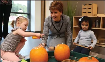  ??  ?? Nicola Sturgeon officially launched the new recruitmen­t campaign at Towerview Nursery in Glasgow
