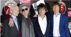  ?? JONATHAN SHORT/THE ASSOCIATED PRESS FILE PHOTO ?? From left, Charlie Watts, Keith Richards, Ronnie Wood and Mick Jagger. Jagger says the Rolling Stones decided to do more shows because they enjoyed playing and audiences seemed to like it.