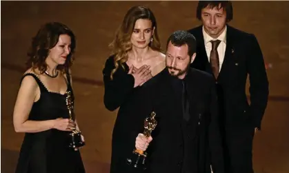  ?? ?? Mstyslav Chernov, Raney Aronson-Rath, Vasilisa Stepanenko and Evgeniy Maloletka on stage. Photograph: Patrick T Fallon/AFP/Getty Images