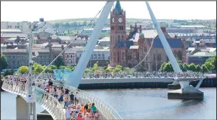  ??  ?? The Peace Bridge across the River Foyle in Londonderr­y