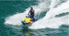  ?? Ahmed Ramzan/ Gulf News ?? A man rides a jet ski at Jumeirah Beach Residence in Dubai. Officials haved issued guidelines including social distancing and etiquette for facilities in Dubai.