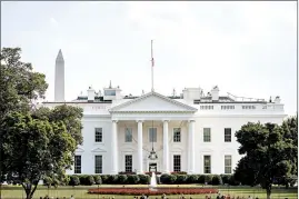  ?? ANDREW HARNIK/AP ?? The White House flag flies at half-staff Monday after President Trump signed a proclamati­on honoring Sen. John McCain and ordering the flag be lowered until his burial.