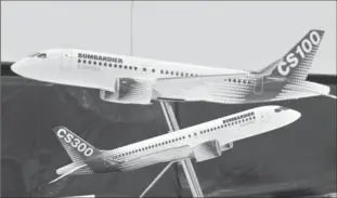  ?? PAUL CHIASSON, THE CANADIAN PRESS ?? Bombardier reported a US$981-million net loss in 2016, down from US$5.34 billion a year earlier.