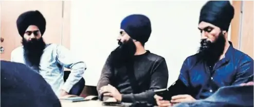  ?? YOUTUBE ?? Harwinder Singh, left, Shamsher Singh and Jagmeet Singh at an event hosted by the National Sikh Youth Federation.