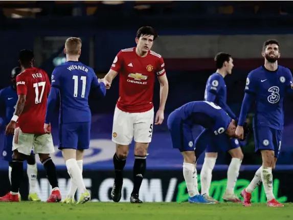  ?? (Getty) ?? Players interact following a dull goalless draw at Stamford Bridge