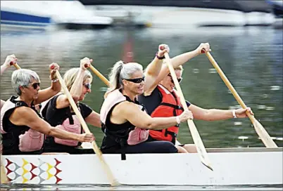  ?? Special to the Herald ?? The Skaha Underdogs paddle their way to the Mixed B Division title at the Penticton Dragonboat Festival this past weekend on Skaha Lake.