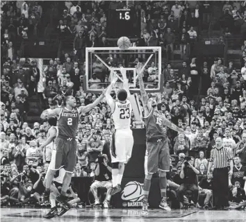  ?? JASEN VINLOVE, USA TODAY SPORTS ?? Wichita State’s Fred VanVleet launches a game-ending miss Sunday against Kentucky.