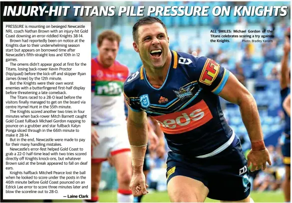  ?? Photo: Bradley Kanaris ?? ALL SMILES: Michael Gordon of the Titans celebrates scoring a try against the Knights.