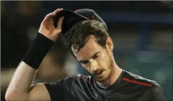  ?? KAMRAN JEBREILI — THE ASSOCIATED PRESS FILE ?? Andy Murray reacts after he lost a match to Spain’s Roberto Bautista Agut last month in Abu Dhabi, United Arab Emirates.