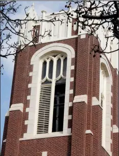  ?? El Dorado News-Times/CAITLAN BUTLER ?? The carillon inside the bell tower of El Dorado’s historic First Presbyteri­an Church was removed Monday as part of a long-awaited preservati­on effort for the instrument.