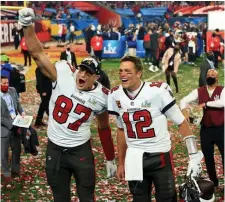  ?? Getty ImAges FILe ?? ‘GOING TO BE PRETTY EXCITING’: Tom Brady, right, Rob Gronkowski and the Tampa Bay Buccaneers will open the NFL season by taking on the Dallas Cowboys on Thursday night.