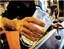  ?? ISAAC HALE FOR THE LOS ANGELES TIMES ?? If you can pour beers or make mixed drinks, Instawork can help you find bartending gigs. That’s one way to make $500 fast.