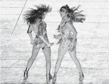  ?? Angela Weiss / AFP via Getty Images ?? Shakira, left, and Jennifer Lopez perform during the halftime show at Super Bowl LIV last Sunday in Miami Gardens, Fla.