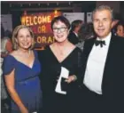  ??  ?? St. JosephHosp­ital Foundation board secretary FrancesOwe­ns, left, and Mark Cordova with Colleen Sandrin, the foundation’s president/chief executive.