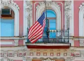  ??  ?? The flag of the United States flies outside the US Consulate building in St.Petersburg on Friday. — AFP