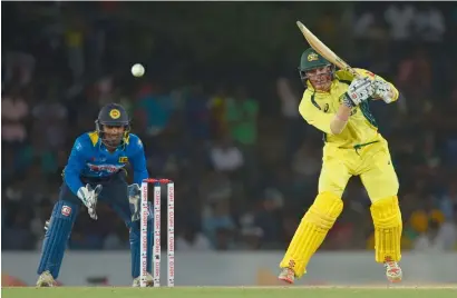  ?? — AFP ?? George Bailey on his way to match-winning unbeaten 90 during fourth one-dayer against Sri Lanka in Dambulla.