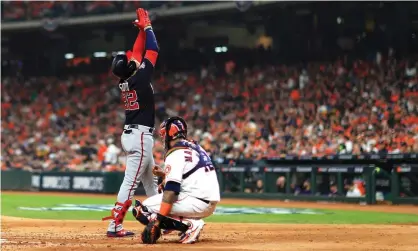  ??  ?? Washington’s Juan Soto celebrates his solo home run in the fourth inning. Photograph: Mike Ehrmann/Getty Images