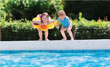  ??  ?? Routine testing helps pool owners stay on top of sanitation and pH levels to keep pool water optimal.