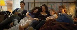  ?? SAN FRANCISCO JEWISH FILM FESTIVAL ?? A writing professor (played by Justin Long, left) and his family go through a series of challenges in the comedy “Safe Spaces.”