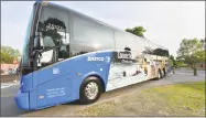  ?? Contribute­d photo ?? Two DATTCO motor coaches featuring photos of central Connecticu­t tourism attraction­s and the state’s tourism website were unveiled last week at the Essex Steam Train and Riverboat in Essex.