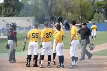  ?? Jesse Munoz / COC Sports Informatio­n ?? College of the Canyons baseball players Anthony Lepre (55), Anthony Medina (20), Ivan Lomeli (2) and Wes Felber (9) greet center fielder Cole Kleszcz at home plate moments after hitting a three-run home run in the fourth inning of a 6-5 loss to Santa...