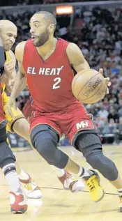  ?? LYNNE SLADKY/AP ?? Wayne Ellington is one of the many Heat players who are showing up for regular, informal workouts.