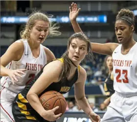  ?? Alexandra Wimley/ Post- Gazette ?? 19. North Allegheny’s Rachel Martindale, with ball, came back from a torn ACL to star in basketball and softball.